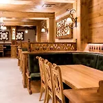 Ośrodek wypoczynkowy Grand Stasinda Bal Sylwestrowy Animacje Impreza Integracyjna Dwa Posiłki Bogaty Bufet Baseny Kręgielnia Grota Sauny Squash Siłownia Place Zabaw Widoki 1000mnpm 3*